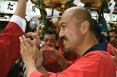 Celebrating the procession of the Mikoshi.