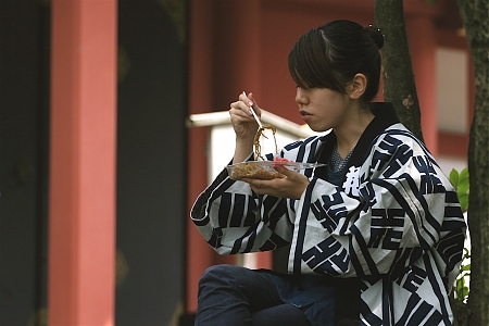 Eating udon noodles at a Japanese Festival in Tokyo.