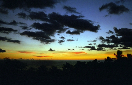 A Hawaiian sunset from the Island of Oahu.