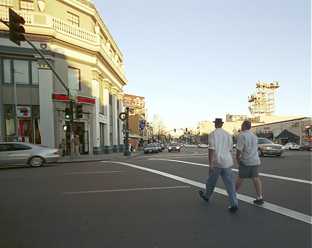 Two men crossing University Avenue in the Hillcrest area  of San Diego, CA.