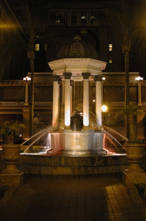 A view of the Horton Plaza fountain at night.