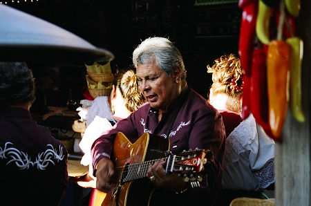 A mariachi guitarist performing in Old Town, San Diego, CA.