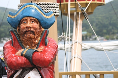 A pirate aboard a sightseeing boat on Lake Ashi