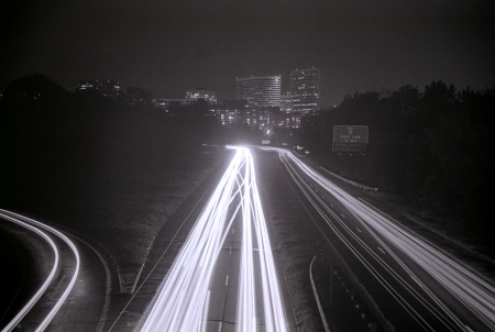 A view of Rossyln Virginia at night from a bridge overlooking the GW Parkway.