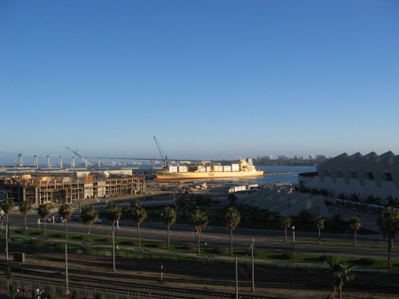 A large cargo ship docking at the main cargo depot in the San Diego habor.