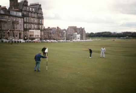 Four blokes finishing their round at St. Andrews Royal & Ancient Golf Club in Scotland.