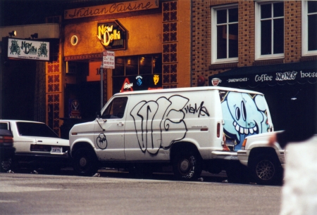 A photo of a van painted with graffiti in San Francisco.