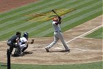 Ryan Howard swings and connects in a game at Petco Park in San Diego, CA.