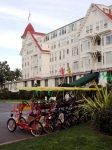 A group of quadricycles outside the Hotel Del Coronado in San Diego, CA.