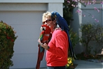 A unique sight of a man walking his two parrots on Coronado Island in San Diego, CA.