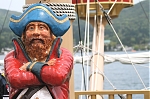 A pirate aboard a sightseeing boat on Lake Ashi